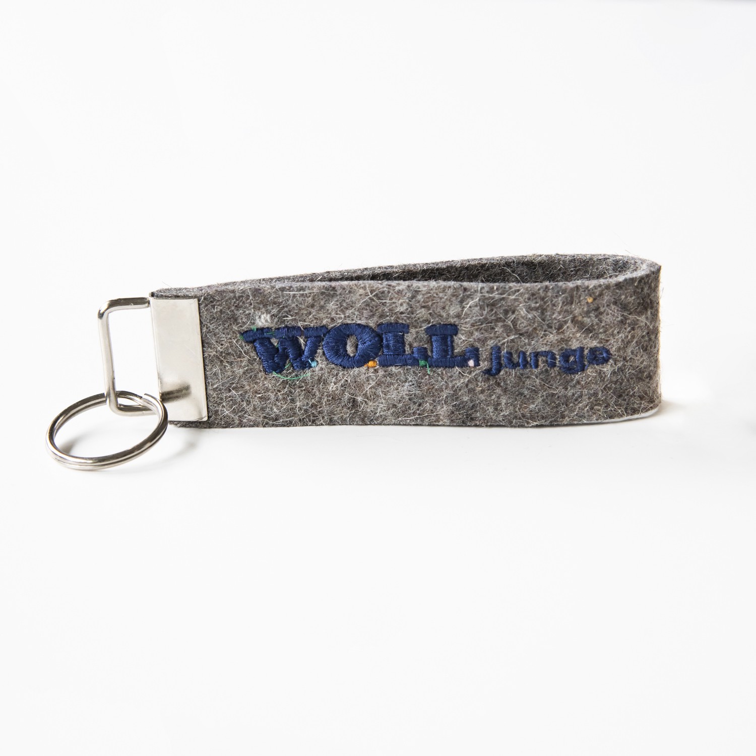 Schlüsselanhänger WOLL Junge grau