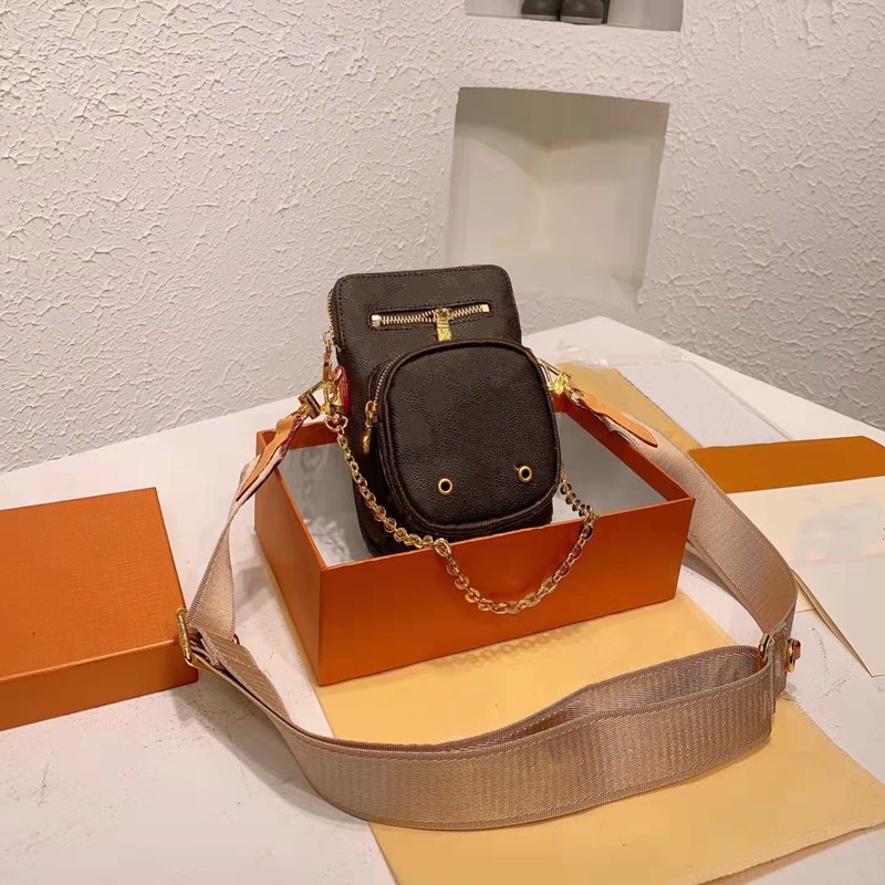 2022 Hommes Femmes Sacs de téléphone Bandoulière Smartphone de luxe Smartphone Chaîne De Chaîne De Mode Mini Tote-Totes Pure Nouveau Cross Corps