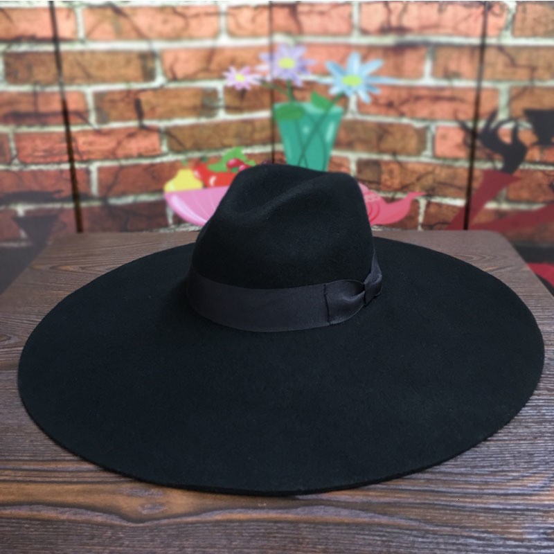 2021 Nouvelles femmes 16cm Grande laine de laine de large feutre Chic Floppy Chaud Hiver Trilby Ruban Bowknot Church Mariage Fedora Jazz Hat 02OH