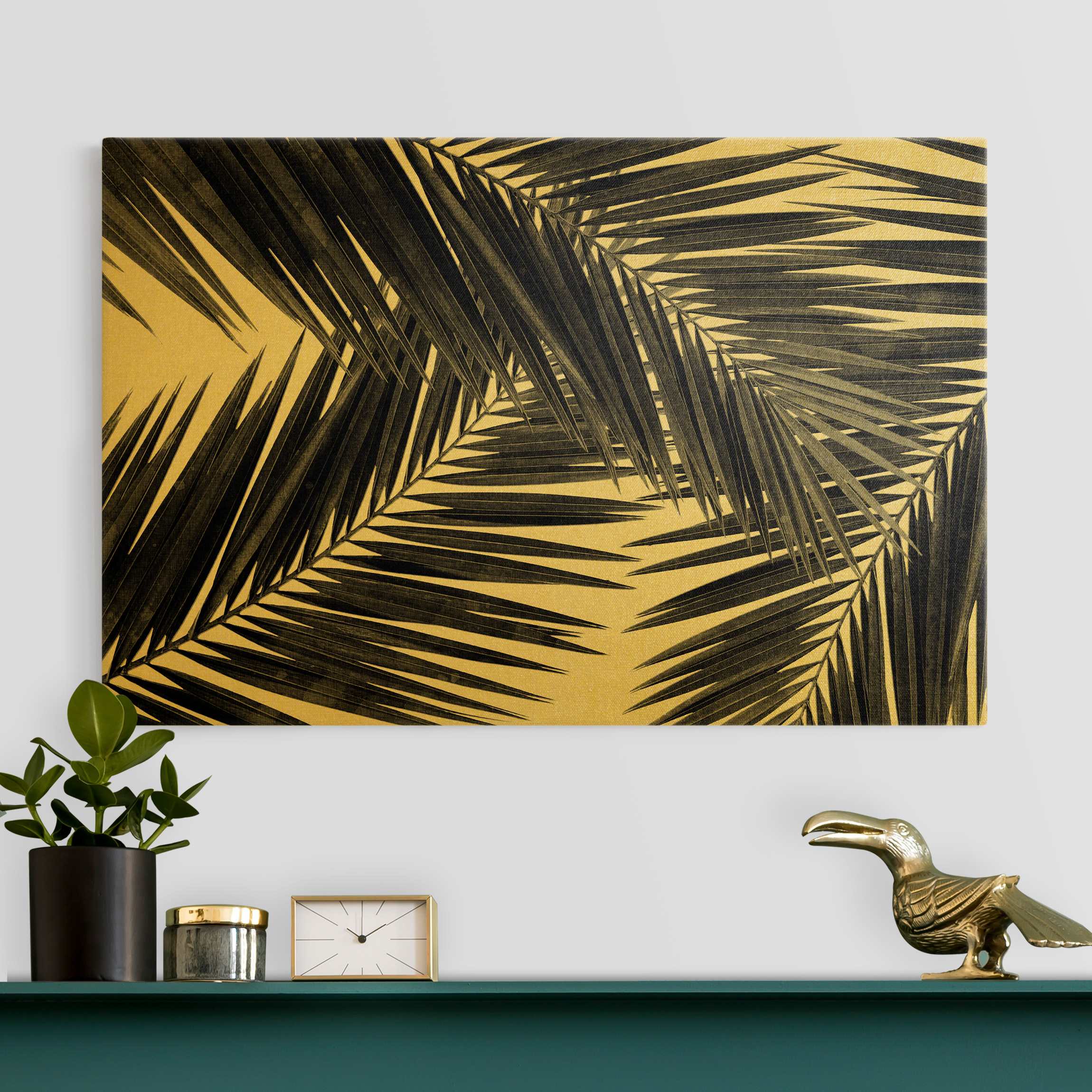Leinwandbild Gold Blick durch Palmenblätter Schwarz-Weiß